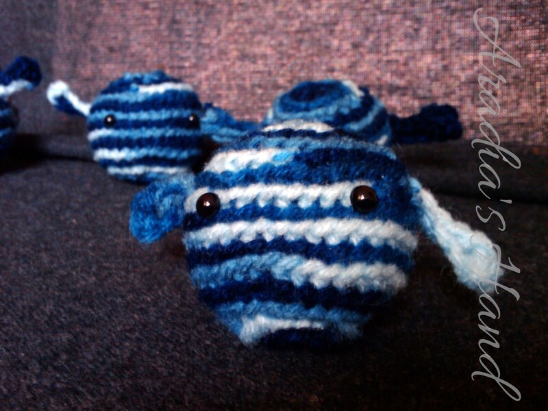 Blue crochet amigurumi alien doll