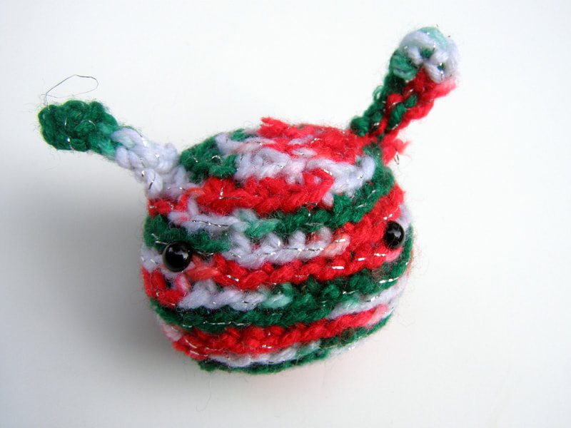 Red white green crochet amigurumi alien doll