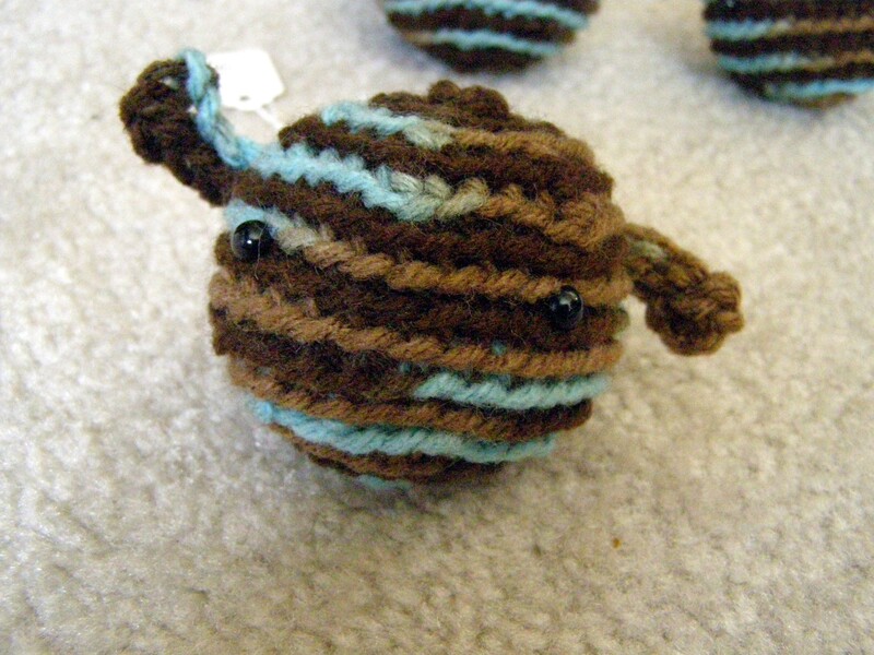 Brown and blue crochet amigurumi alien doll