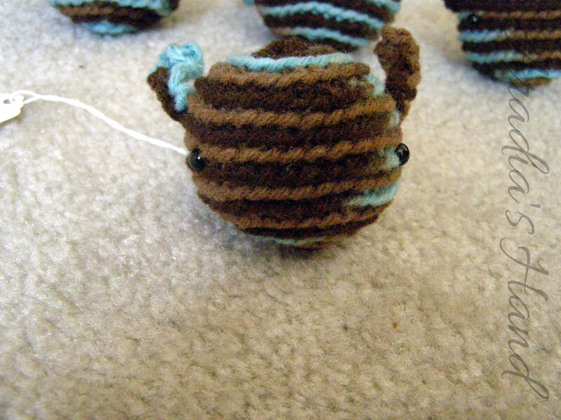 Brown and blue crochet amigurumi alien doll