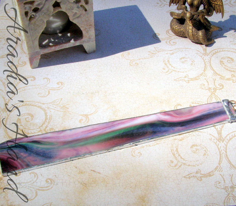 Pink and green swirled stained glass incense burner